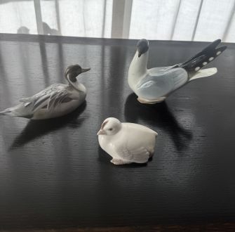 Коллекция фарфоровых фигурок птиц